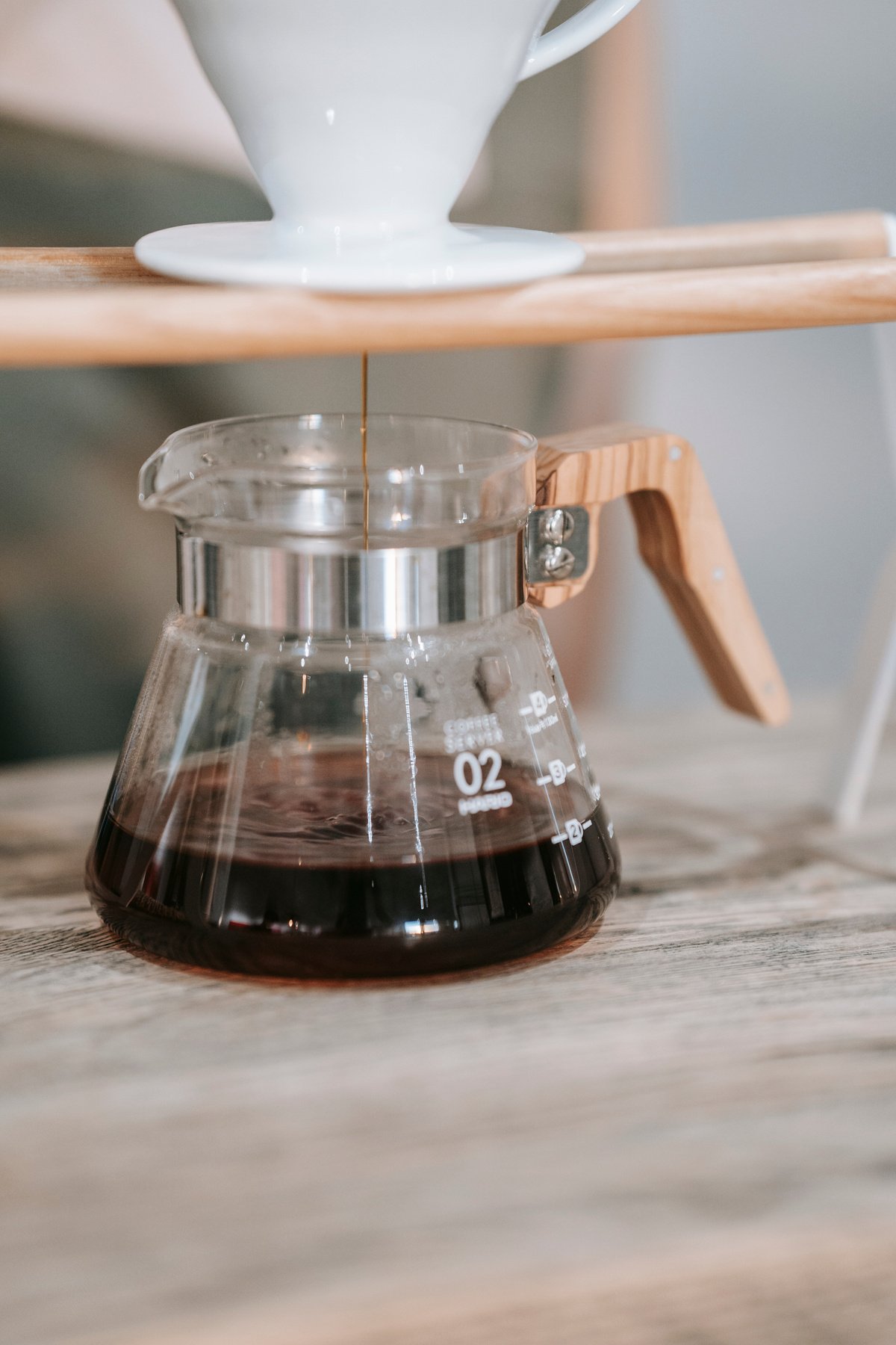 Clear Glass Jar With Black Liquid Inside